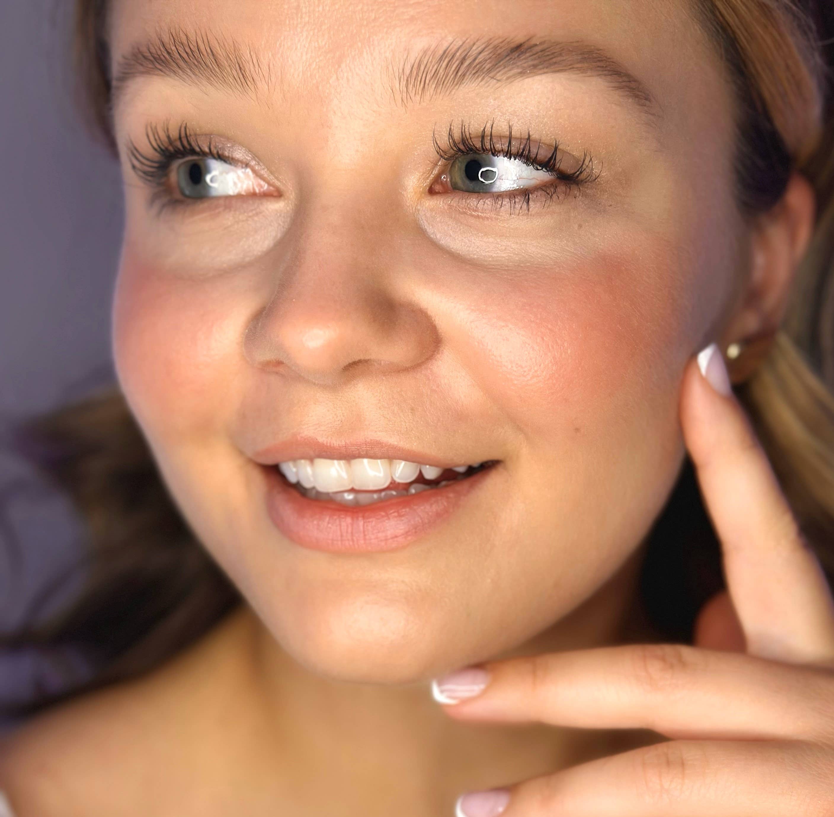 Close-up of a woman's face with a blurred background