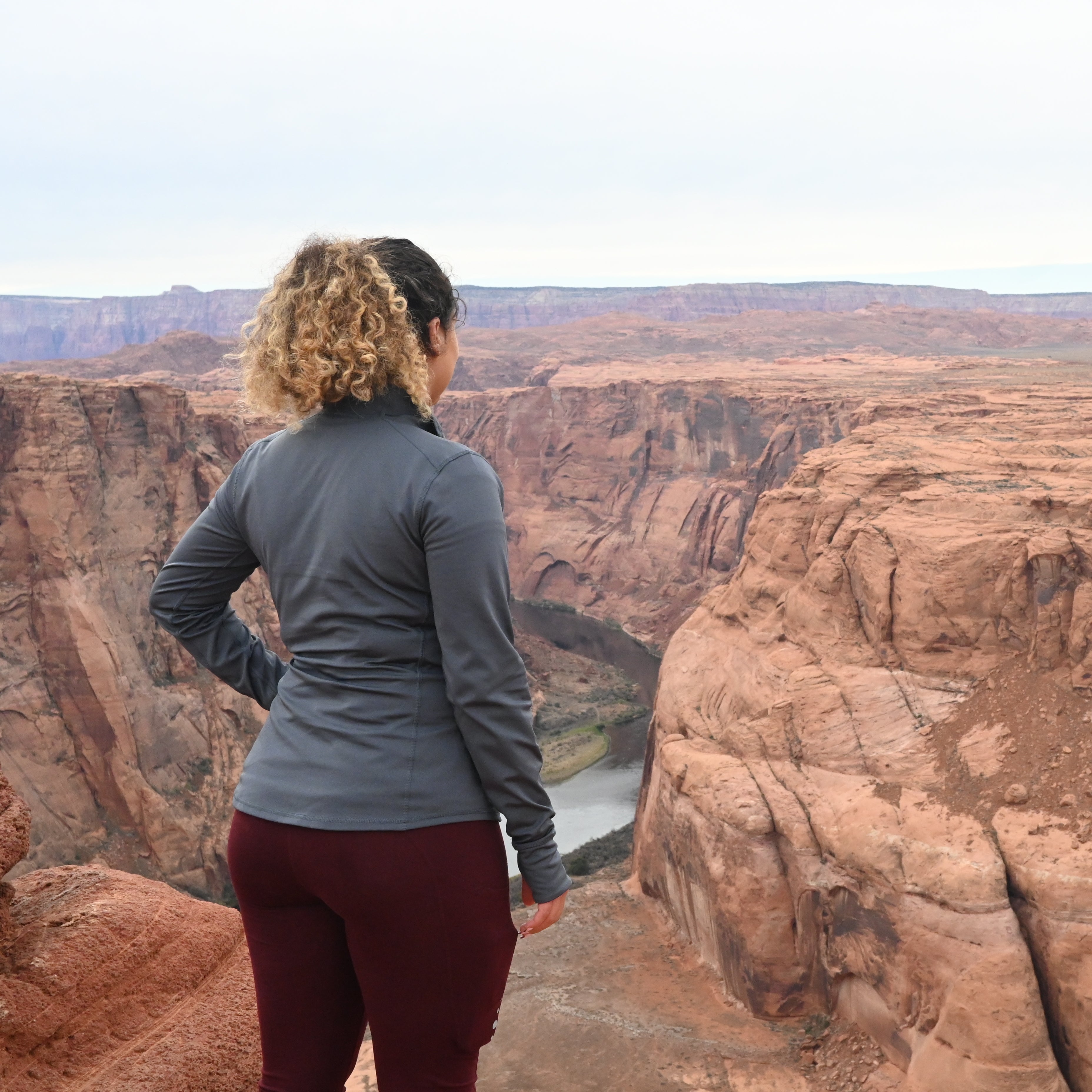 Hiker overlooking Horseshoe Canyon